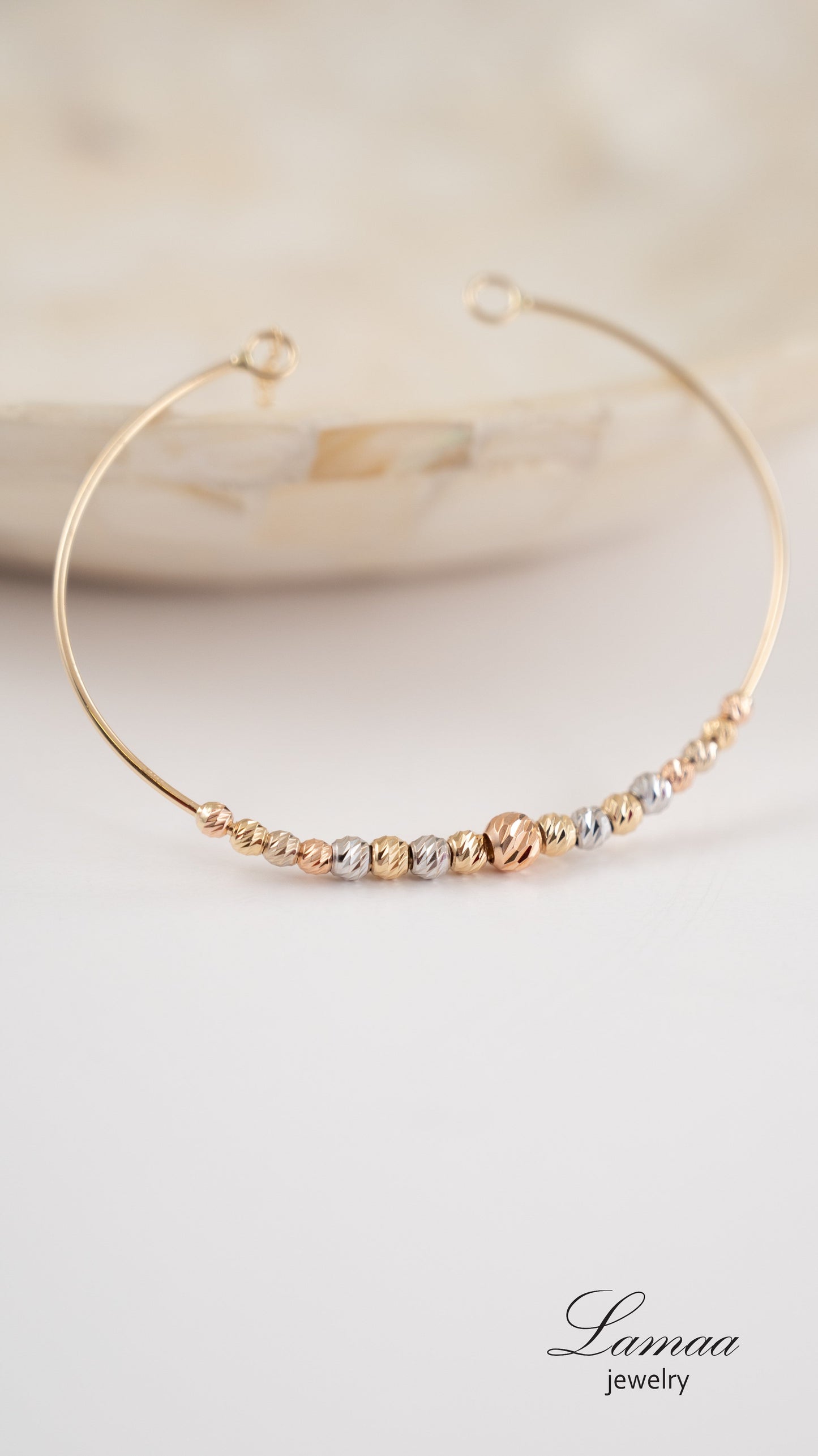 18KT GOLD BANGLE