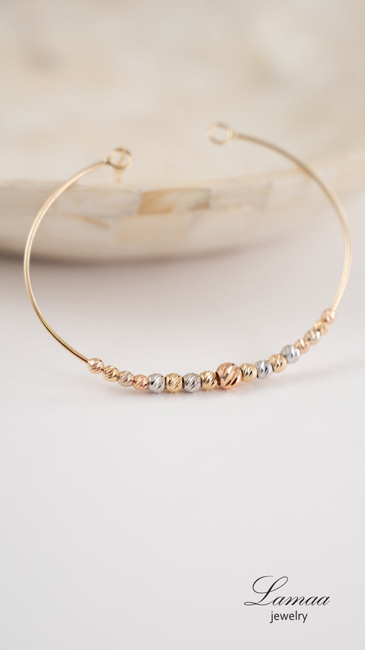 18KT GOLD BANGLE